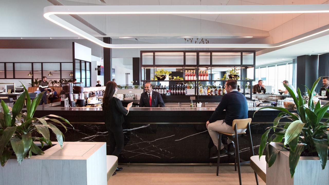 Have a drink while you wait at the Qantas domestic business lounge bar in Melbourne.
