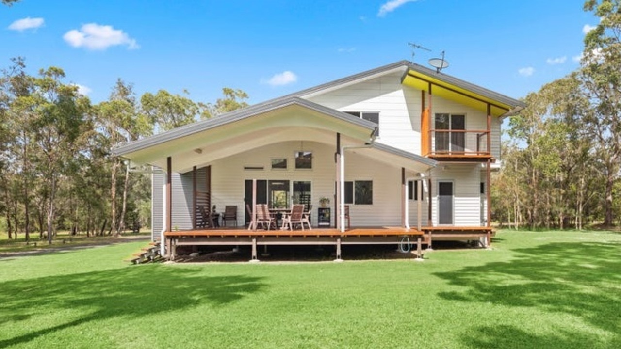 A bushland retreat at Walligan set on 4.5ha offers a lot to love, with high ceiling and front and rear verandas.