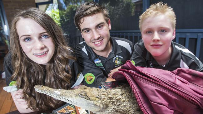 Rose Wiltshire, 15, Jamieson Brodie and Ethan Carroll, 14 with Cleo preparing for school in 2017. Picture: Sarah Matray