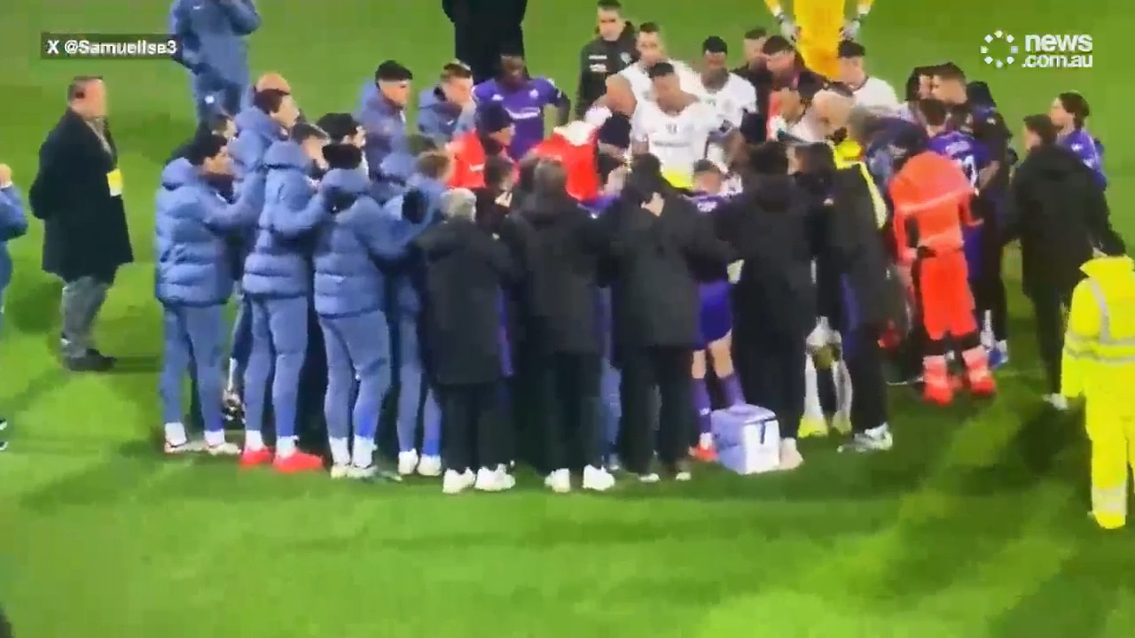 Footballer collapses on pitch with teammates in tears