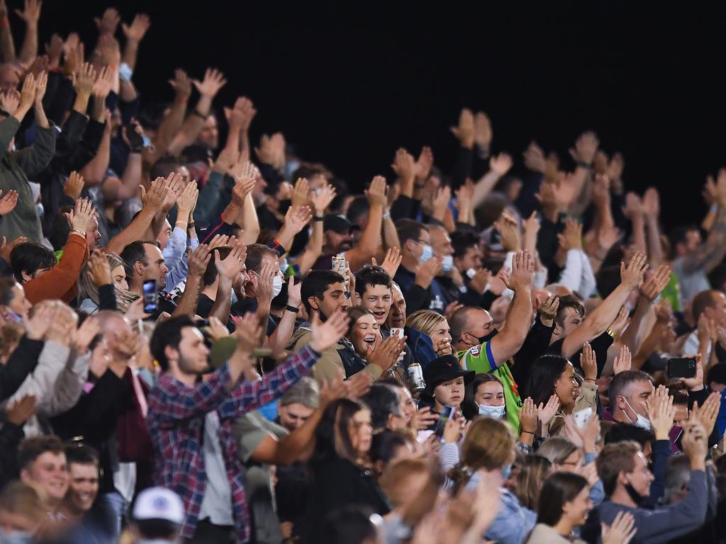 Fans perform the Viking clap during the round 25 NRL match between the Canberra Raiders and the Sydney Roosters at BB Print Stadium, on September 02, 2021, in Mackay, Australia. Picture: Albert Perez