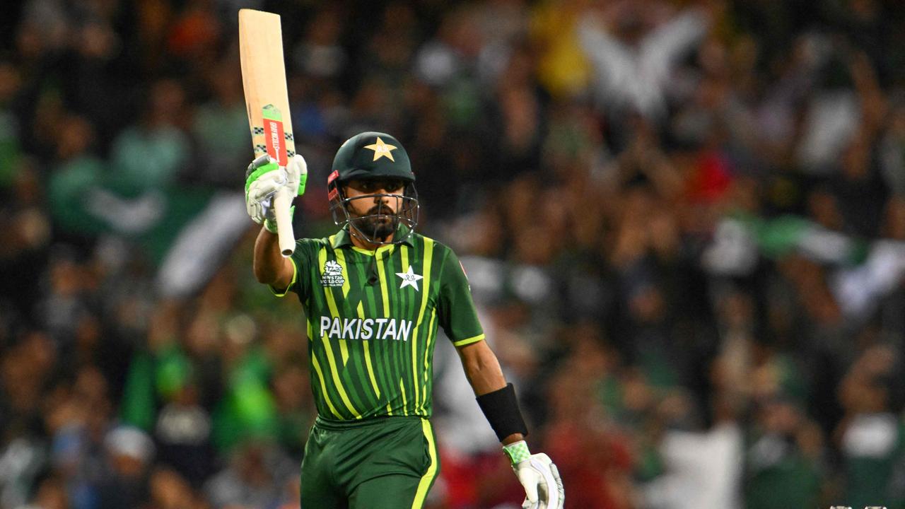 Pakistan's Captain Babar Azam celebrates after scoring a half-century (50 runs) during the ICC men's Twenty20 World Cup 2022 semi-final cricket match between New Zealand and Pakistan. (Photo by Saeed KHAN / AFP)