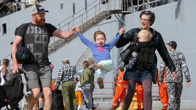 Joy abounds as Mallacoota evacuees reach dry land. Picture: Ian Currie