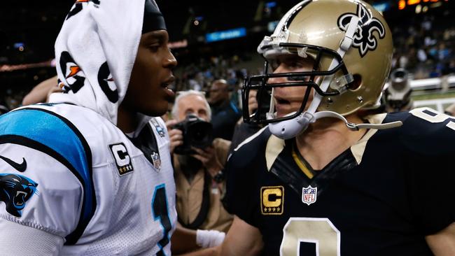 Cam Newton #1 of the Carolina Panthers and Drew Brees #9 of the New Orleans Saints greet each other after the game.