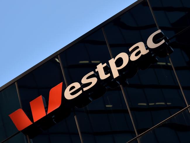 The Westpac sign is seen at their banking headquarters in Sydney on May 8, 2017.  Australian banking heavyweight Westpac posted a six percent rise in interim net profit to 2.89 billion USD on May 8, 2017 on the back of a strong performance from institutional operations. / AFP PHOTO / PETER PARKS