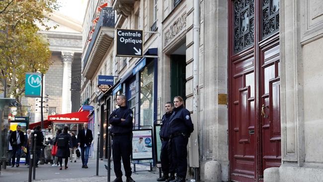 Police officers standing guard at the entrance of the hotel residence, where US reality television star Kim Kardashian was robbed in 2016. Picture: AFP