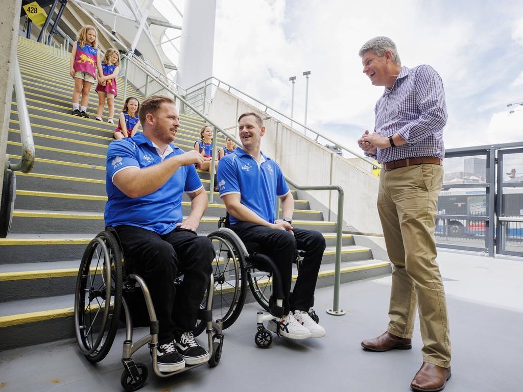 Paralympian basketballers Matt McShane and Sam White with Minister for Sport Stirling Hinchliffe at the Gabba on Sunday. Picture: Lachie Millard