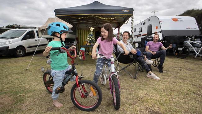 Rebecca Cole and Stewart Wines with kids Coen and Edie. Picture: David Geraghty