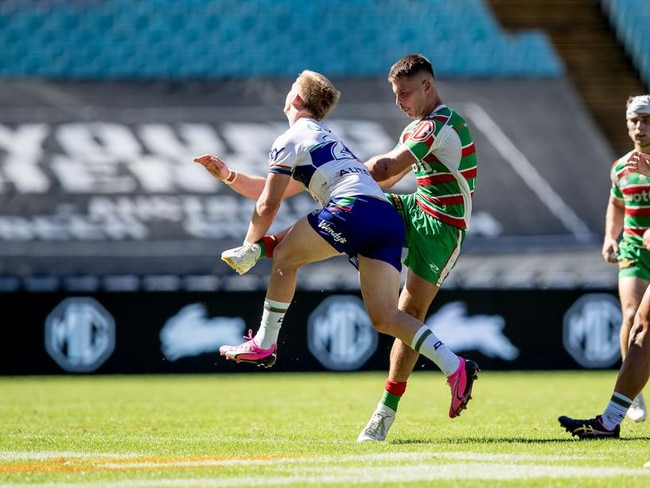 The moment Ilias broke his leg, after illegal contact from a Warriors defender as he attempted a kick in a NSW cup game for the Rabbitohs. Picture: NRL Images.