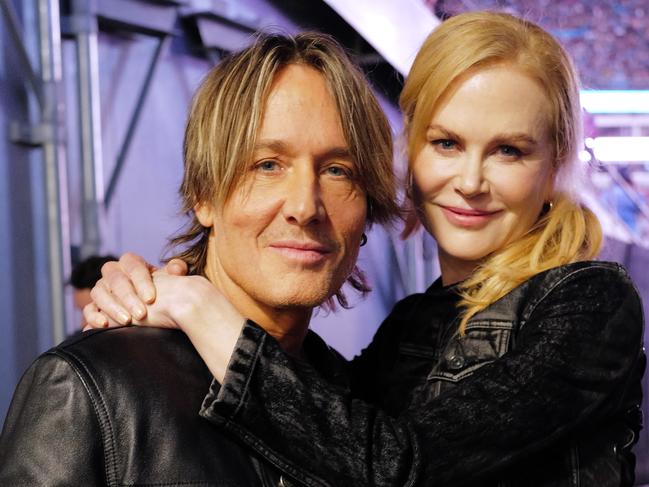 CHARLOTTE, NORTH CAROLINA - OCTOBER 26: (L-R) Keith Urban and Nicole Kidman are seen backstage at the Concert For Carolina Benefit Concert at Bank of America Stadium on October 26, 2024 in Charlotte, North Carolina. (Photo by John Shearer/Getty Images for Concert For Carolina)