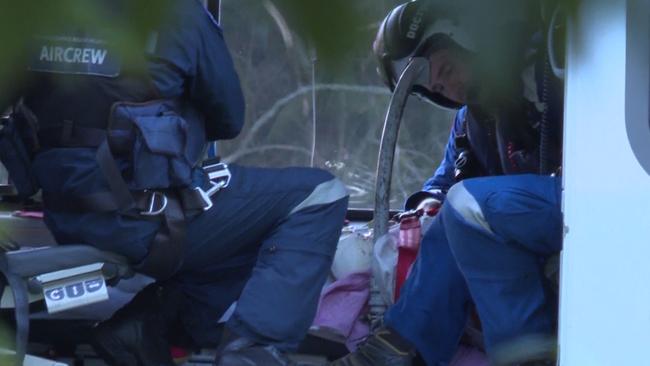 Emergency services treat the shark attack victim on Saturday. Picture: TNV