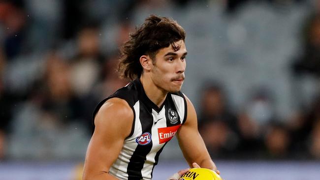 MELBOURNE, AUSTRALIA - APRIL 02: Reef McInnes of the Magpies in action during the 2022 AFL Round 03 match between the Collingwood Magpies and the Geelong Cats at the Melbourne Cricket Ground on April 02, 2022 In Melbourne, Australia. (Photo by Dylan Burns/AFL Photos via Getty Images)