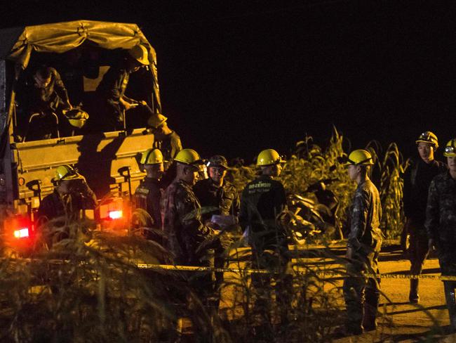 The authorities warned it would be hard to save all five at once on Tuesday, with the rescue plan designed for four. Pictured, Thai soldiers arrive on a military truck at the Tham Luang cave area. Picture: AFP Photo / Ye Aung Thu