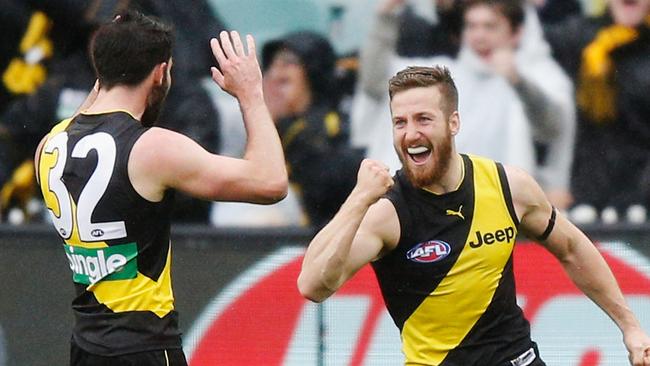 Corey Ellis and Kane Lambert celebrate a goal earlier this season. Picture: Getty Images