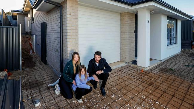 Kellie and Daniel Barratt, and Kellie's daughter Amelia Frawley. Picture: Russell Millard Photography