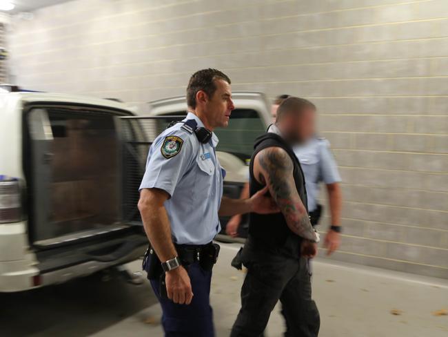 One of the seventeen people arrested during raids on the Central Coast.