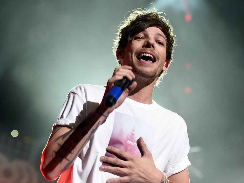 “Don’t worry, I will be back in July,” Louis Tomlinson promised his Italian fans on Twitter. Picture: AFP/Kevin Winter.