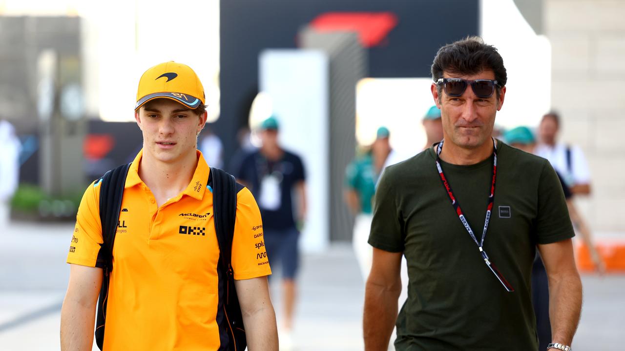 Piastri and Webber walking through the paddock. (Photo by Mark Thompson/Getty Images)