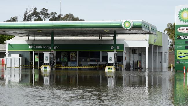 A petrol station in Shepparton partly submerged in flood waters. Picture: NCA NewsWire / Andrew Henshaw