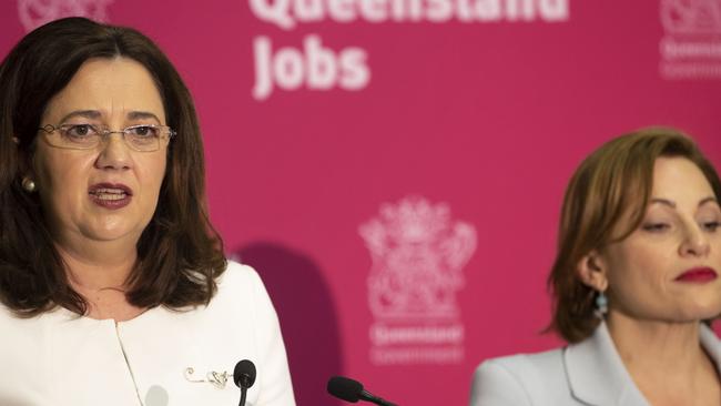 Queensland Premier Annastacia Palaszczuk and Treasurer Jackie Trad speak during the state government's 2019-20 Queensland budget media briefing in Brisbane. Picture: Glenn Hunt/AAP