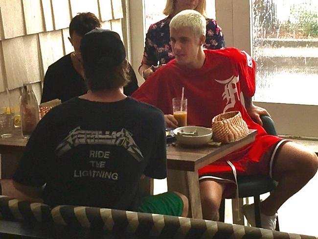 The biggest star in Sydney, Justin Bieber, stopped by a Manly cafe to try the famous Vegemite. Picture: Supplied