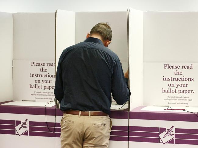 Casting a federal election vote at pre-poll. Picture: Brendan Radke