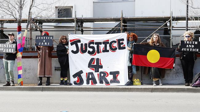 Family and friends of Jari Wise stand out the front of Hobart Magistrates Court last year as his former girlfriend Melissa Oates attended court to enter a plea which was later adjourned. Picture: ZAK SIMMONDS