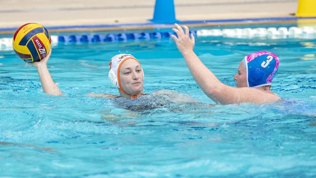 Matilda Moore, right, moves to defend against Rachel Roberts in the Queensland Premier League. Picture: Richard Walker