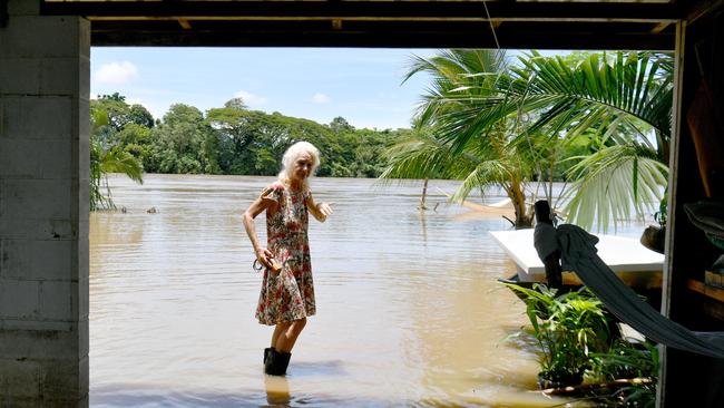 Cordelia resident Camille O'Sullivan stands in her backyard next to the Herbert River. Picture: Evan Morgan