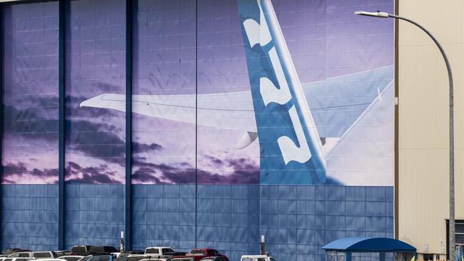 The tail of a Boeing 777 jetliner painted on the exterior of Boeing’s production facility in Everett, Washington. Picture: AFP