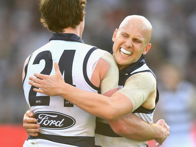 GEELONG, AUSTRALIA - JUNE 09: Jed Bews and Gary Ablett of the Cats celebrate a goal during the round 12 AFL match between the Geelong Cats and the North Melbourne Kangaroos at GMHBA Stadium on June 9, 2018 in Geelong, Australia.  (Photo by Quinn Rooney/Getty Images)