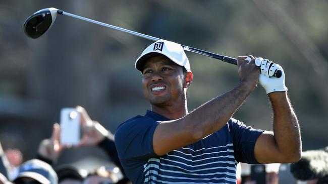 SAN DIEGO, CA — JANUARY 26: Tiger Woods plays his shot from the 13th tee during the second round of the Farmers Insurance Open at Torrey Pines North on January 26, 2018 in San Diego, California. Donald Miralle/Getty Images/AFP == FOR NEWSPAPERS, INTERNET, TELCOS &amp; TELEVISION USE ONLY ==