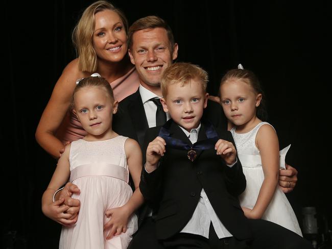 Sam Mitchell shares his Brownlow success with wife Lyndall and kids Smith (centre), Emmerson and Scarlett. Picture: Michael Klein