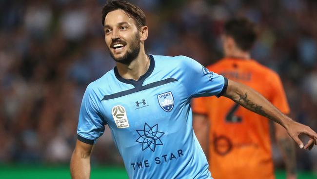 Milos Ninkovic celebrates scoring against Brisbane. Picture: AAP