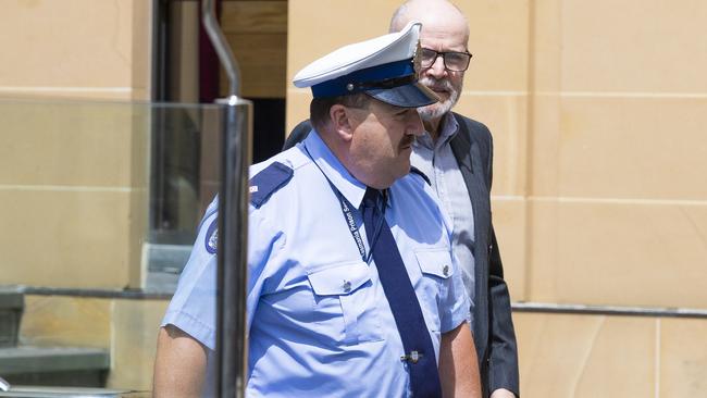 Convicted sex offender Darrel George Harington leaving the Supreme Court in Hobart.