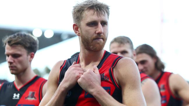 SYDNEY, AUSTRALIA – AUGUST 06: Dyson Heppell of the Bombers looks dejected during the round 21 AFL match between the Greater Western Sydney Giants and the Essendon Bombers at GIANTS Stadium on August 06, 2022 in Sydney, Australia. (Photo by Jason McCawley/AFL Photos/via Getty Images )