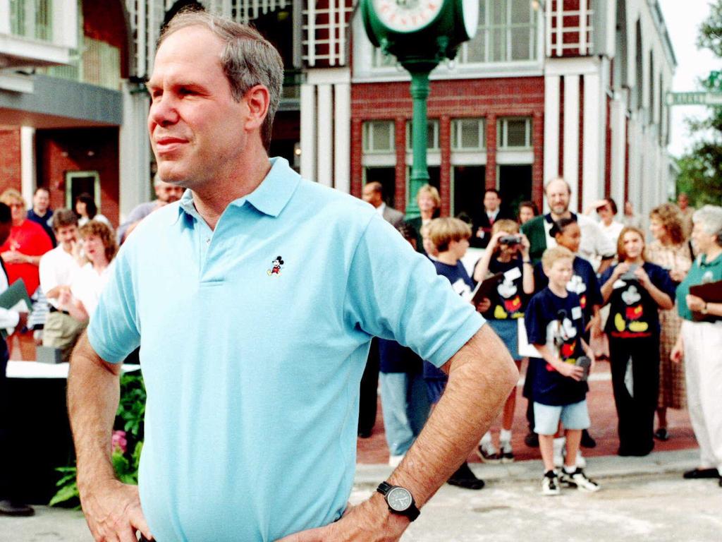 Walt Disney Company chief Michael Eisner stands in the town square of Celebration, a city being built on Disney property in 1996. Picture: AP Photo/ Orlando Sentinel, Tom Burton.