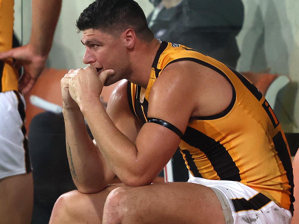 Hawthorn's Jonathon Patton in tears on the bench after another injury.