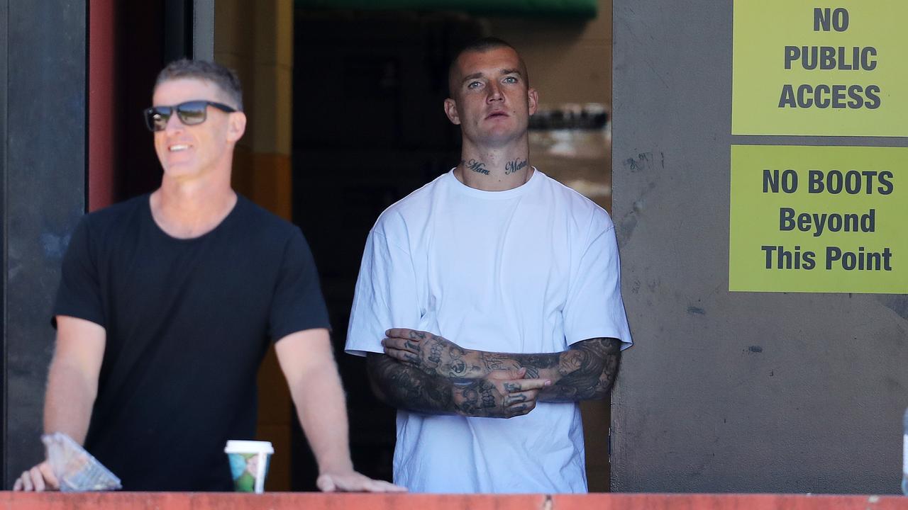 Dustin Martin and Damien Hardwick watch the Tigers’ women’s team. Picture: Michael Klein