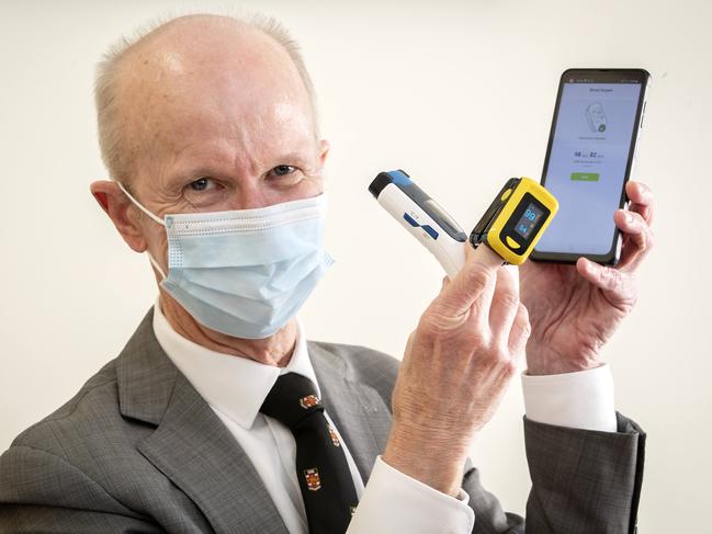 Regional health commander for Covid Dr Stephen Ayre with a mobile phone with the My Health Care Manager app installed, a digital thermometer and an oximeter. Pictures: Chris Kidd