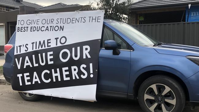 A protest billboard outside Al Siraat College in Epping.