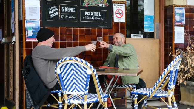 Steve Dallimore and Jack are seen enjoying a beer at the Bells Pub in Woolloomooloo wharf. Picture:  NCA NewsWire / Gaye Gerard