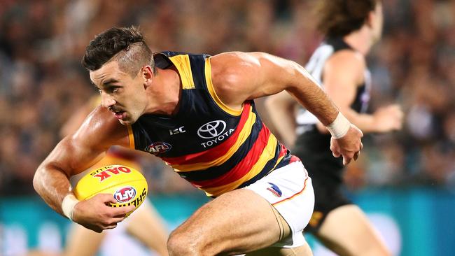 Crows captain Taylor Walker breaks away during his four-goal Showdown. Picture: Morne de Klerk (Getty Images)