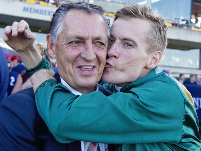 Blake Shinn cuddles trainer Peter Snowden (left). Picture: Jenny Evans