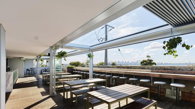 Guests can sit on the rooftop which has sweeping views of the bay and the city. Picture: Supplied