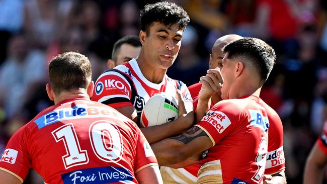 Joseph Suaalii of the Roosters takes on the defence during the round one NRL match between the Dolphins and Sydney Roosters at Suncorp Stadium on March 05, 2023 in Brisbane, Australia. (Photo by Bradley Kanaris/Getty Images)