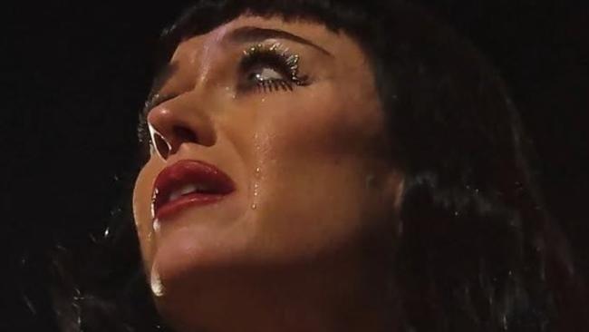 Katy Perry breaks down on stage.