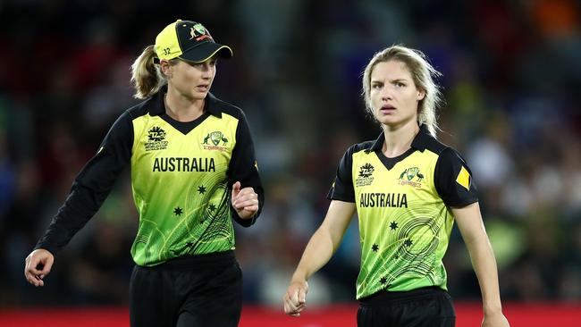 Meg Lanning of Australia talks to Nicola Carey of Australia during the ICC Women's T20 Cricket World Cup match between Australia and Bangladesh at Manuka Oval on February 27, 2020 in Canberra, Australia. (Photo by Cameron Spencer/Getty Images)