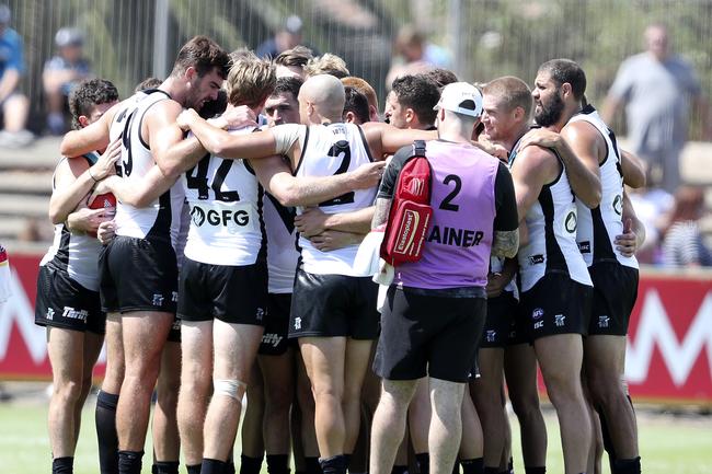 Port Asdelaide Power players huddle before the start of the JLT match against North Melbourne at Alberton Oval.. Picture Sarah Reed