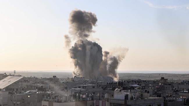 Smoke and dust rise following an Israeli air strike in Rafah, in the southern Gaza Strip on October 30, 2023, amid the ongoing battles between Israel and the Palestinian group Hamas. Picture by Said Khatib/AFP